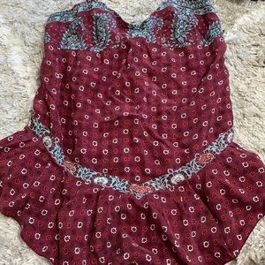 A maroon and blue floral top